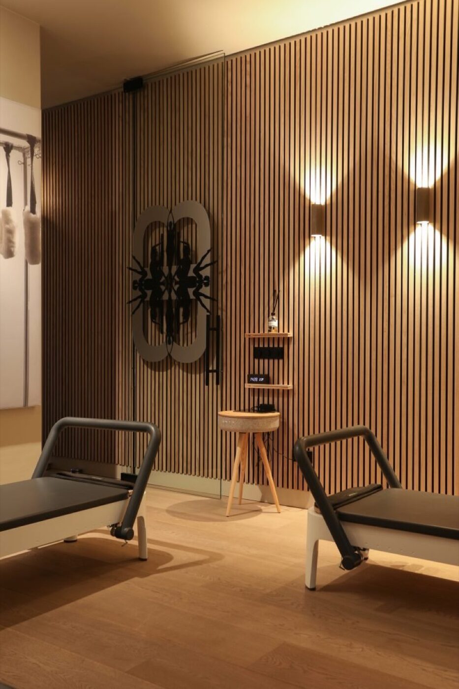 The warm, wood-lined Pilates studio at Bodyvita South