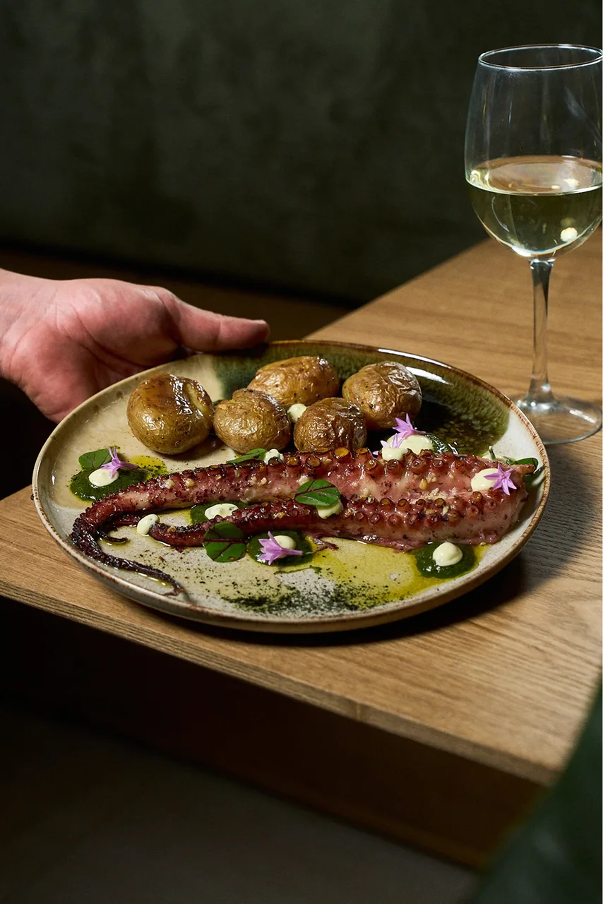 A beautifully plated dinner served at DOMA Portugal