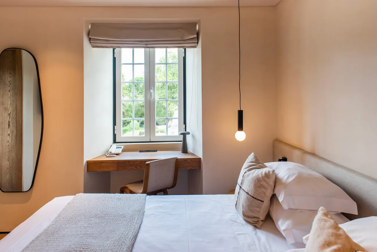 A peaceful bedroom at DOMA Portugal