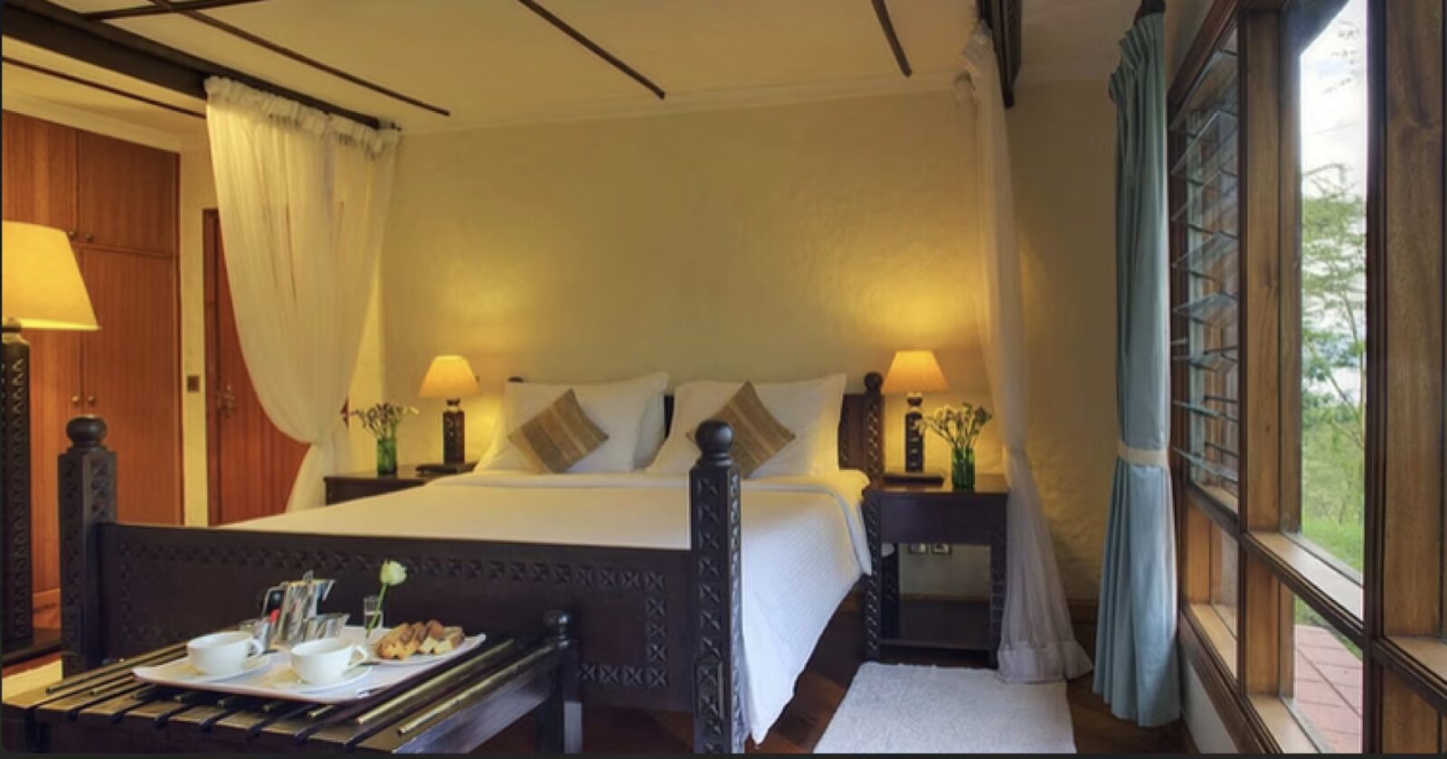 A warm, characterful bedroom at Loldia House